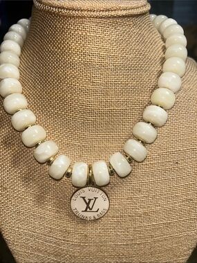 Louis Vuitton Cream Bead Necklace with Gold Accents and LV Medallion